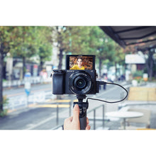 Load image into Gallery viewer, Sony Alpha 6400 E-mount camera with APS-C sensor (ILCE-6400L) | 24.2 MP Mirrorless Camera, 11 FPS, 4K/30p, with a 16-50mm Power Zoom lens.
